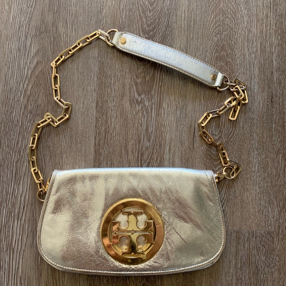 Tory Burch gold clutch with chain and dust bag